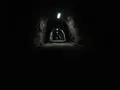 Through a tunnel darkly