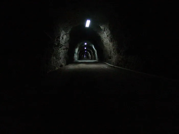 Through a tunnel darkly