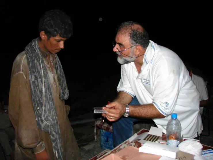 Doctor handing out medicines