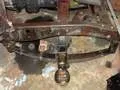 Front axle and suspension