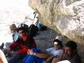 Resting underneath a big rock
