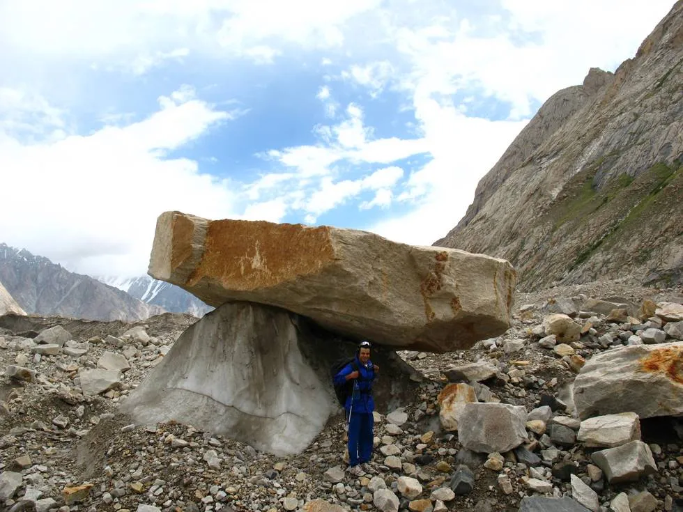 Big rock balanced on ice