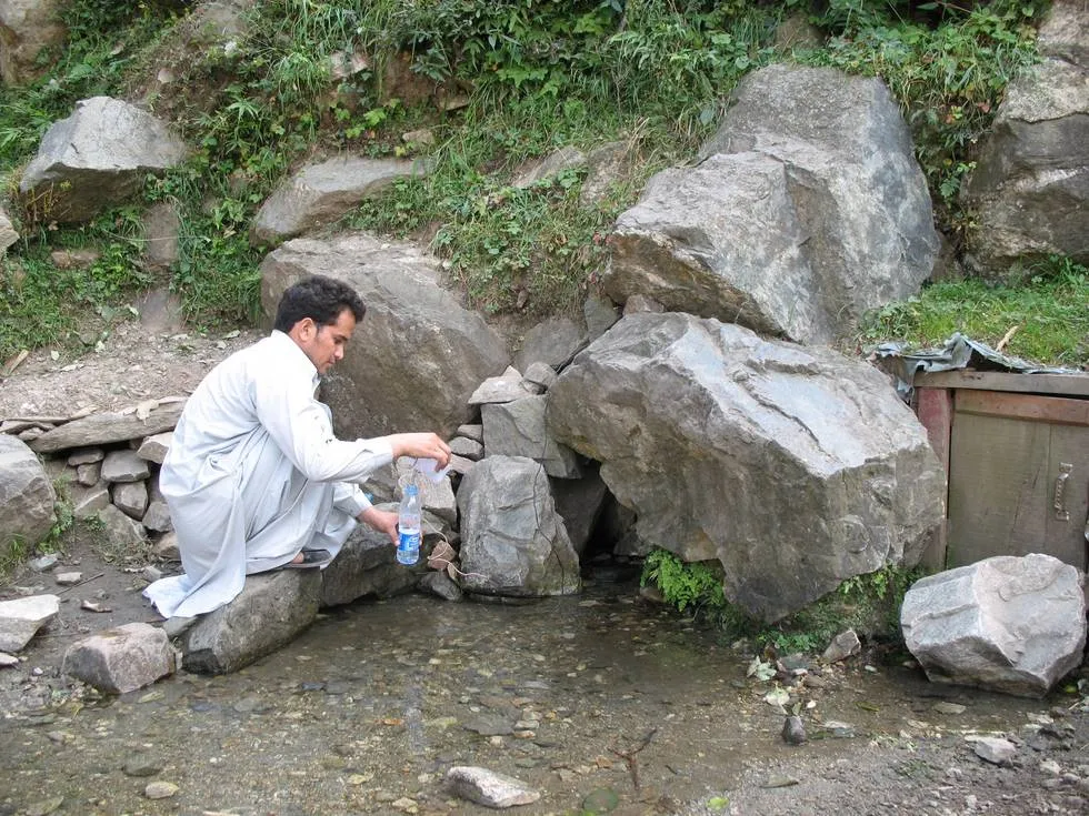 Filling up our drinking water from a spring