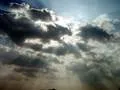Sun shining through clouds
