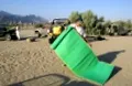 Winding up the camp in the morning. The plastic rug