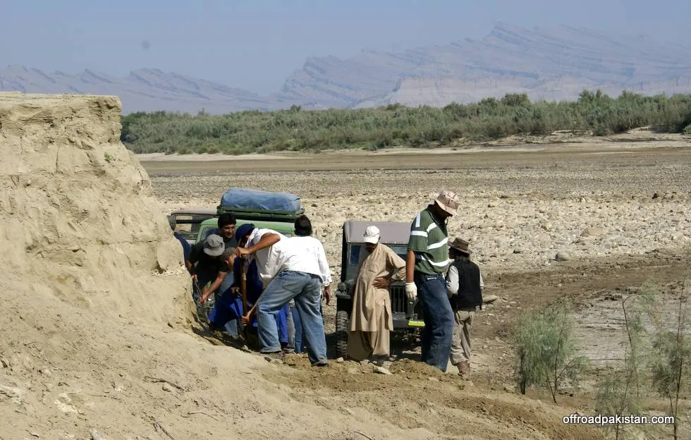 We dig into the hillside and make the track wide enough for the vehicles to pass through.