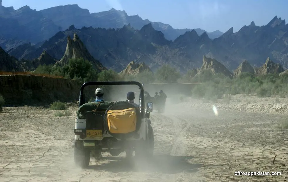 KO&#x27;s white jeep heading towards Goran.