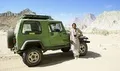 Taimur Mirza next to his super Green Jeep.