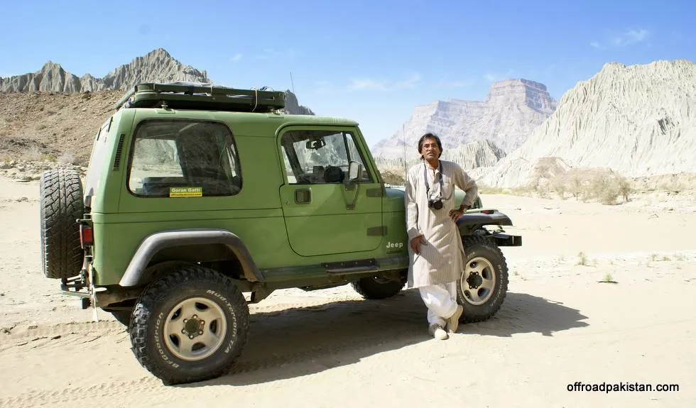 Taimur Mirza next to his super Green Jeep.