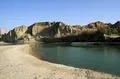 A pool of water in the mostly dry riverbed.