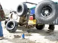 Thats a lot of tires around this jeep