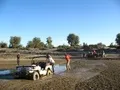It takes two winches to pull out the 'most powerful Jeep' as it is bogged down to the differentials in the Hingol River mud