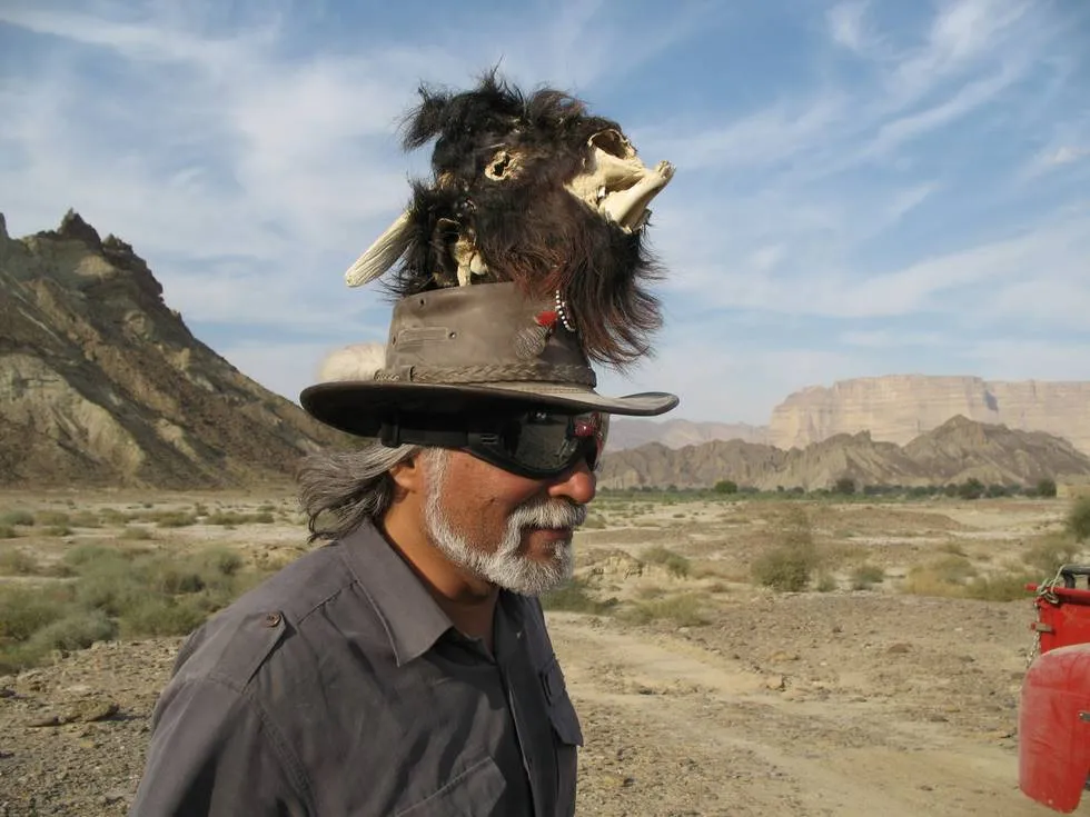 Doc. Mansoor - who else! - with a goat&#x27;s head on his head
