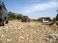 The vehicles make way their way through the boulder strewn territory of Sorh Valley