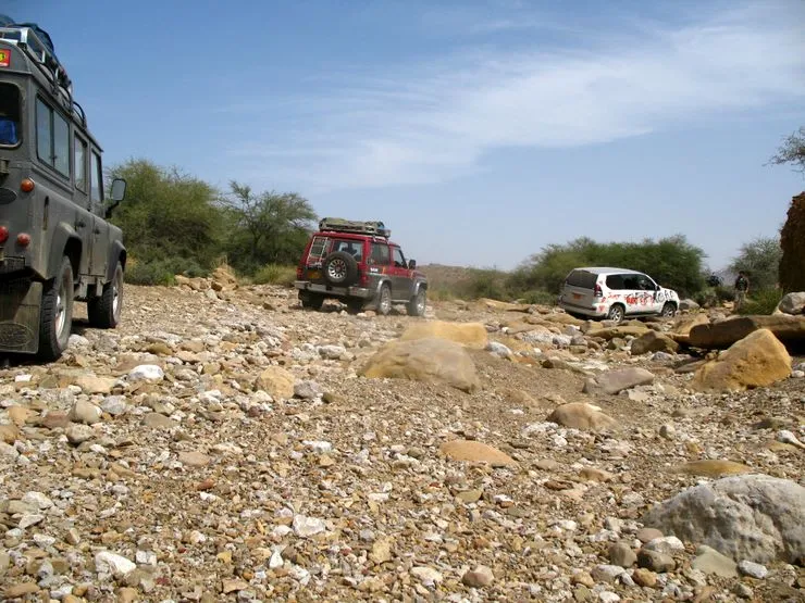 The vehicles make way their way through the boulder strewn territory of Sorh Valley
