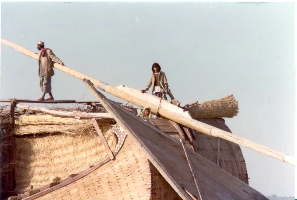 Closeup of a river boat carrying fodder