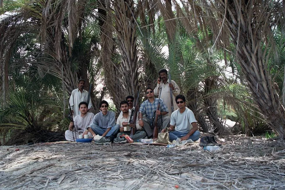 Group Photo amidst Date Trees